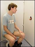 young guy in toilet room